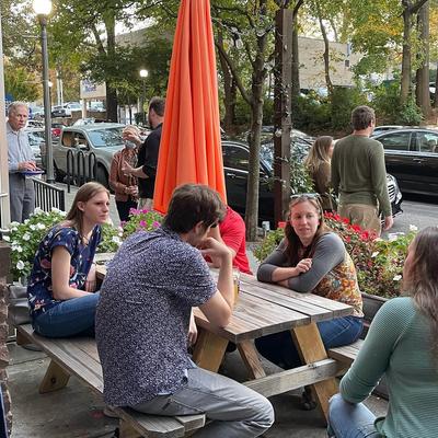 Guests sitting in the outdoor seating area